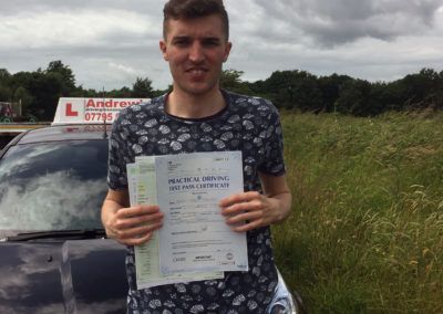 Matt with pass certificate outside Bangor test Centre