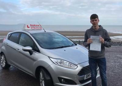 Lewis at penmaenmawr beach after his driving test