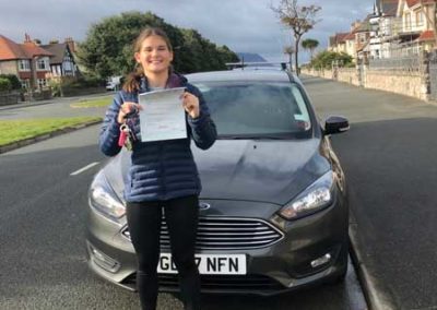 Fran with her car after her driving test