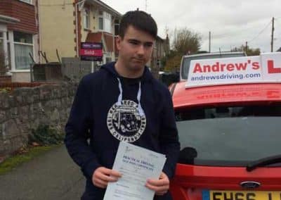 Dylan in Rhyl with driving intructors car