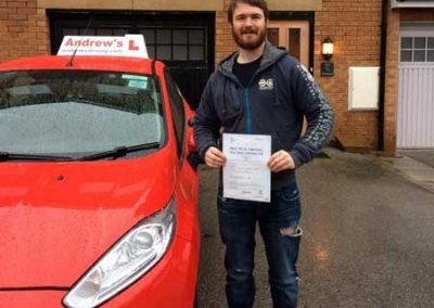 Morgan with his pass certificate in North Wales