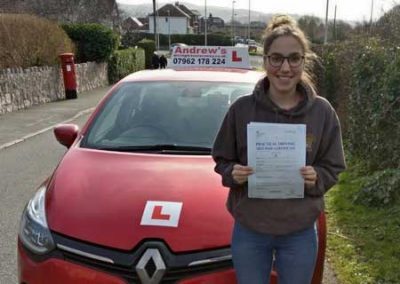 Elen standing by instructors car in Deganwy.