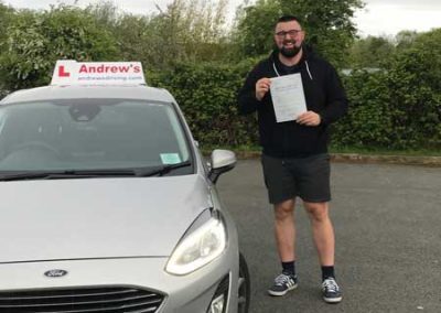 Michael with his DVSA driving test pass certificate