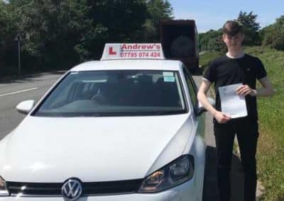 Nathan and a driving school car.