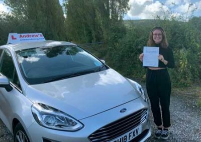 Molly in Rhyl with driving test pass certificate.