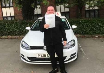 James in Colwyn Bay with his instructors car.