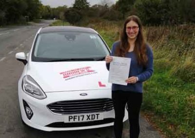 Matea with her driving school car,