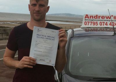 Brady with driving test pass certificate