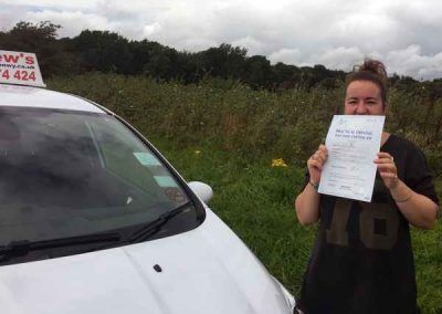 Linsey with her driving test pass certificate in North Wales