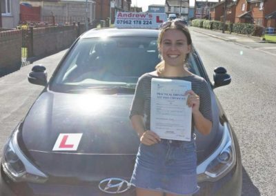 Maisie showing her driving test pass certificate