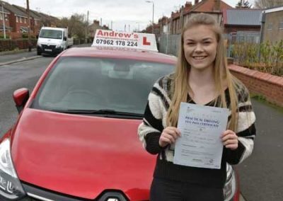 Nia passing her driving test.