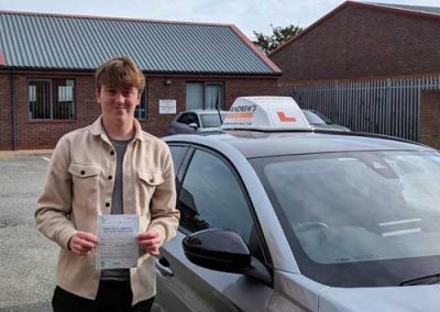 Connor with Carolines Car at Rhyl Driving Test Centre