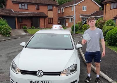 George in Rhos on Sea with a driving test pass certificate