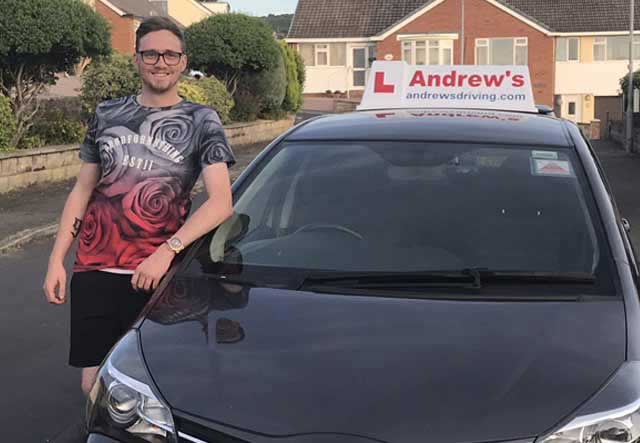 Andrew's Driving School car roof sign