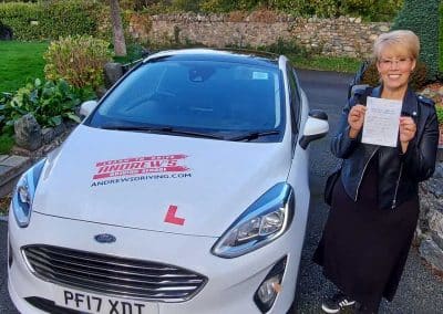 Teresa with Tomas's Driving School car