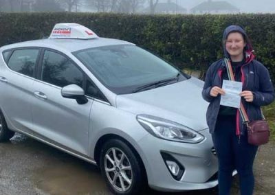 Erin with Jack's Driving instructor car