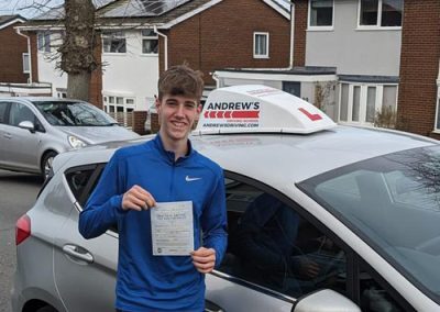 Corey in Llysfaen with his driving test pass certificate