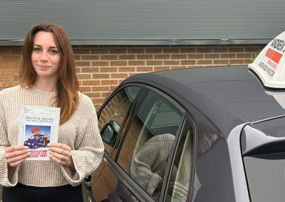 Jodie with automatic driving school car